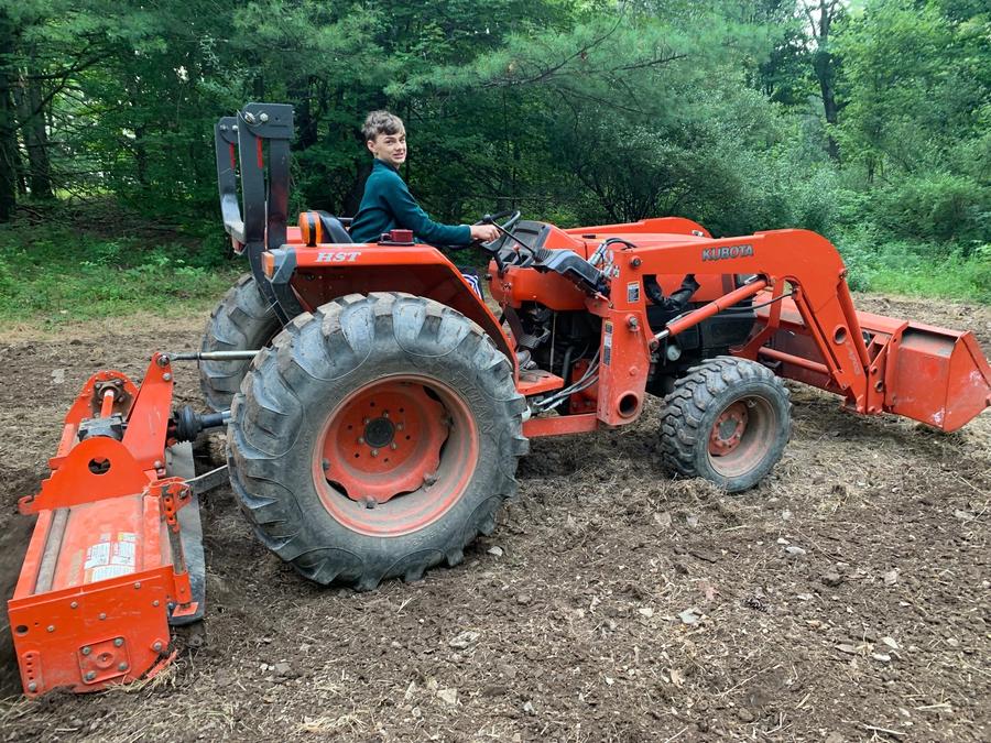 Leo Mertz tilling a food plot.jpg